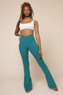 Crisscross Hourglass® Flared Leggings With Pockets - Emerald 15 Crisscross Hourglass® Flared Leggings With Pockets - Emerald -Popflex Clothing Shop CorsetBra BlueIris 1021 CrisscrossHourglassFlare MermaidGreen C1030 02121 Edit Edit